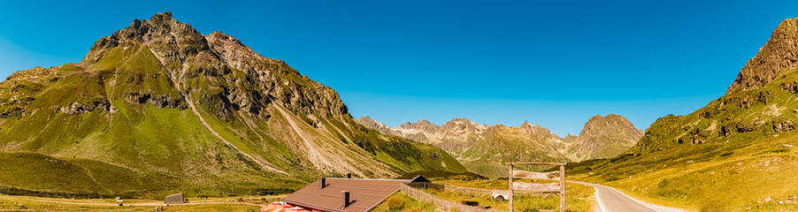 High resolution stitched alpine summer panorama at Sylvretta reservoir, Sylvretta-High-Alps-Street,...