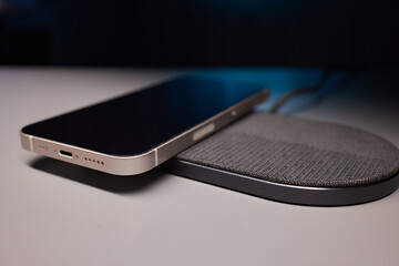 smartphone wireless charging on induction charger. Wireless charger