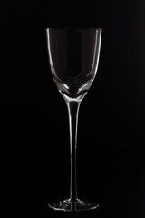 stylized crystal glass, very tall, photographed on a black background, highlighting the outline