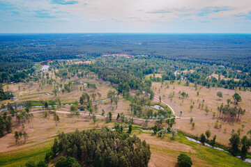 summer landscape from above with the river Gauja, which winds through mixed tree forests, Gauja National Park, Latvia