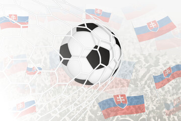 National Football team of Slovakia scored goal. Ball in goal net, while football supporters are waving the Slovakia flag in the background.