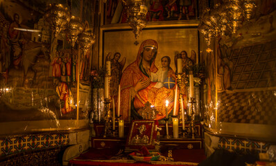 The icon of Jesus Christ and Virgin Mary at the Church of the Holy Sepulchre, Christian shrine, at...