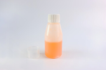 Medicinal syrup and a vessel with liquid volume divisions. Treatment and prevention of diseases. Strengthening immunity.