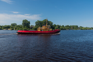 towboat close-up on the river on a sunny summer day.