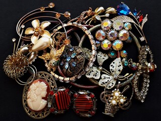 Vintage jewelry, brooches from the 20th century. Jewelry. Beads, colored crystals.