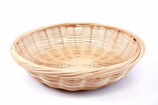 An isolated white background holds an unfilled wooden basket meant for fruit or loaves of bread..A deserted white background accommodates an unoccupied wooden receptacle intended for produce or bread.
