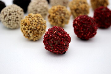 Several chocolates on white background