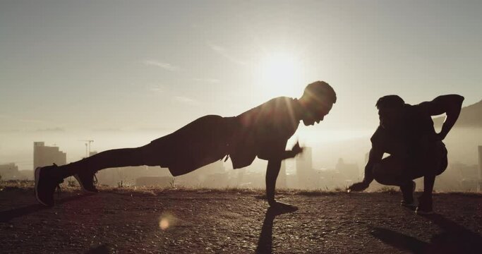 Fitness silhouette, workout with athlete and personal trainer, motivation and exercise outdoor at sunrise, healthy and active in Cape Town street. Push up, strong and muscle, coach and men training.