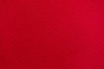 Sponge texture background. Close-up of red bath sponge with porous structure for background. Macro...