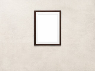 Empty photo frame over white wall of bedroom or office. Minimalist interior design. Vertical