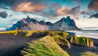 Majestic summer scene of Stokksnes headland with Vestrahorn (Batman Mountain) on background. Unbelievable evening view of Iceland, Europe. Beauty of nature concept background - obrazy, fototapety, plakaty
