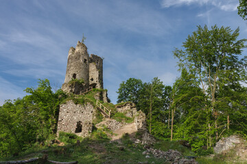 Fototapeta na wymiar Ruins of medieval castle Starhrad , Slovakia, Mala Fatra, spring day, blue sky with clouds.