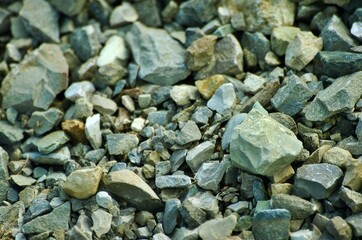 Background of stones and pebbles and small rough gray sharp stones