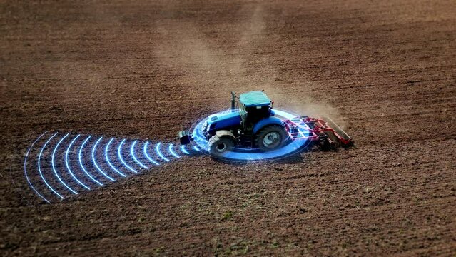 Autonomous agricultural tractor with HUD elements. Smart farming concept of the future. Self-driving transportation that scans the environment with sensors. 4k footage