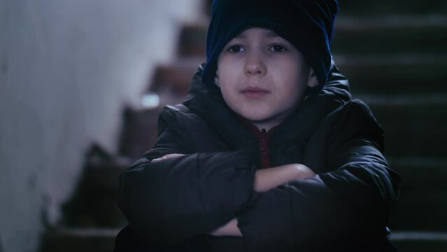 Mischievous Boy's Adventure: Attempting to Hide in Abandoned Building while Wiping Nose