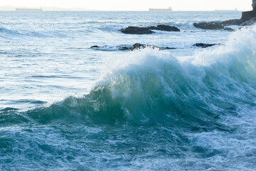 Big sea waves breaking on the beach. Live nature.