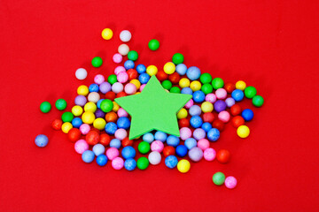 Green star on colored spheres
