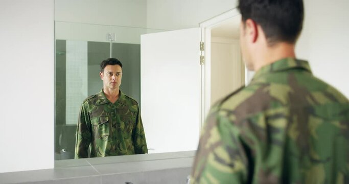 Soldier in bathroom in morning with mirror, uniform and camouflage getting ready for bootcamp. Army barracks restroom, battle and military man looking at reflection with courage, loyalty and service.