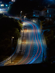 Car Light Trails Illuminate a Nighttime Roadway