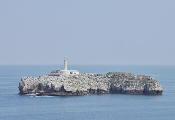 Mouro Island: A Coastal Gem with its Enchanting Lighthouse off Santander's Shoreline