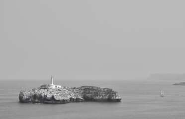 Mouro Island: A Coastal Gem with its Enchanting Lighthouse off Santander's Shoreline