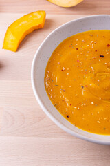 Pumpkin and carrot cream soup. Autumn dish suitable for lunch and dinner.