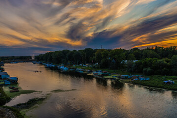Small harbor and view to the Ada bridge on the river Sava in Belgrade, Serbia