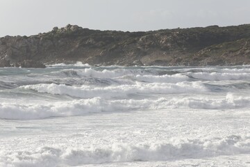 waves breaking on the beach