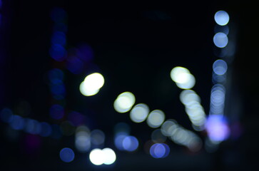 Fototapeta premium Blurred view of night city street 