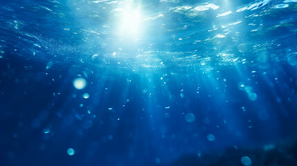 水中に差し込む光と美しい泡の背景