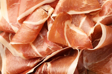 Slices of tasty cured ham as background, top view