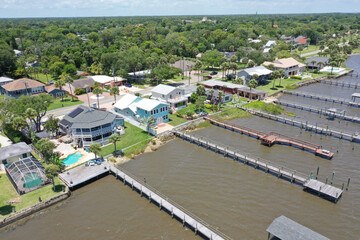 Fototapeta na wymiar Aerial of Halifax River (Intracoastal Waterway ) front homes with boat docks, Daytona Beach, Florida, USA. 
