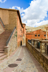 Old street in the center of historic town Albarracin, Spain