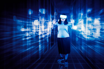 Woman with VR virtual reality goggles