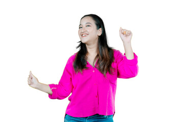 Obraz na płótnie Canvas Cheerful asian girl with loose dark hair having fun and posing on white background