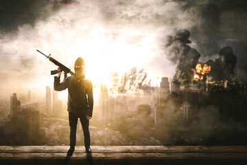 rebel militant terrorist guerrilla with burning city in the background