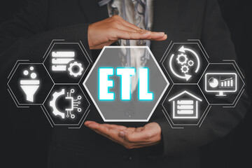 ETL, extract transform load concept, Businesswoman hand holding extract transform load icon on...