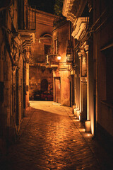 The narrow streets of the baroque style city of Modica, Sicily, Italy - 669770704