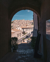 The narrow streets of the baroque style city of Modica, Sicily, Italy - 669770779