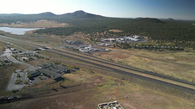 Aerial of hotels and rest stops on Interstate 40 near Williams Arizona