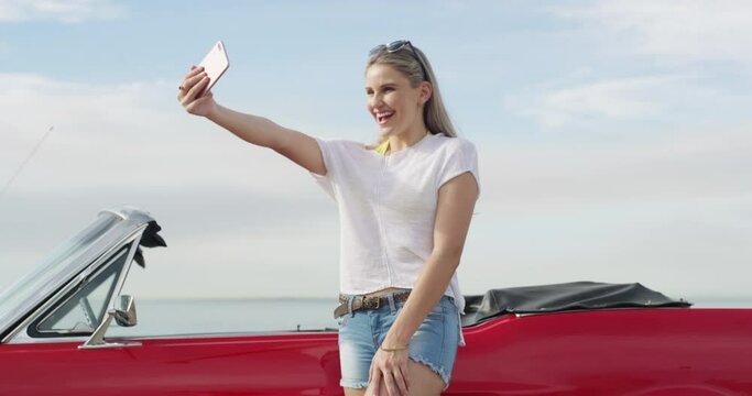 Woman, smile and selfie on road trip to beach for holiday, vacation or travel in Australia. Young person, car and excited in adventure, wellness or relaxation with post, mobile app or profile picture