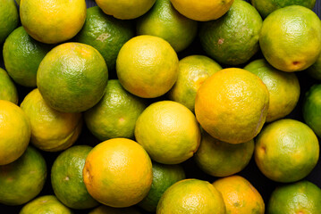 Fresh organic local orange fruit background. - Powered by Adobe