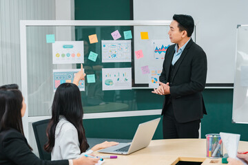 Businesspeople team partner meeting together to brainstorming for new ideas about business marketing project to partner working together planning success strategy enjoy teamwork in modern office