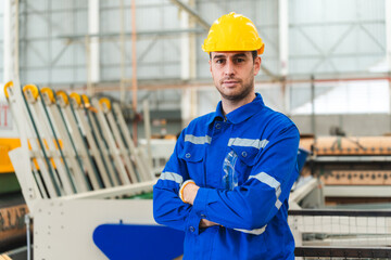 Professional male caucasian engineer or manufacturing worker man person in factory portrait, smart...