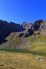 Ailampa lake located on Ak-Suu Traverse trek next to Jyrgalan and Karakol in Kyrgyzstan