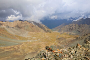 Ala Kol Pass view on a valley descending to Altyn Arashan in Tian Shan mountains, Kyrgyzstan