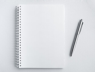 Mockup blank space on spiral notebook. White template on sketch book, vertical full page with silver pen. Top view of paper for draw, note, to do list for creative design and idea memo concepts. - obrazy, fototapety, plakaty