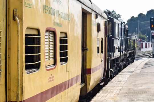 Kathgodam, Uttarakhand, India, September 25 2023 - Indian railway train at Kathgodam railway station platform during morning time, Colourful train at Kathgodam, Uttarakhand railway station