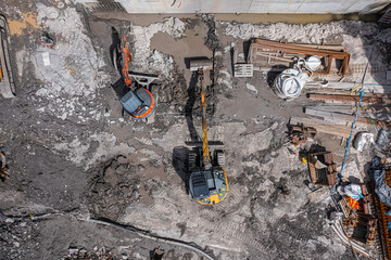 Aerial drone photo of demolition site and construction workers