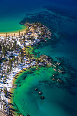 Lake Tahoe / Sand Harbor Beach Covered in Snow - View From Helicopter - obrazy, fototapety, plakaty